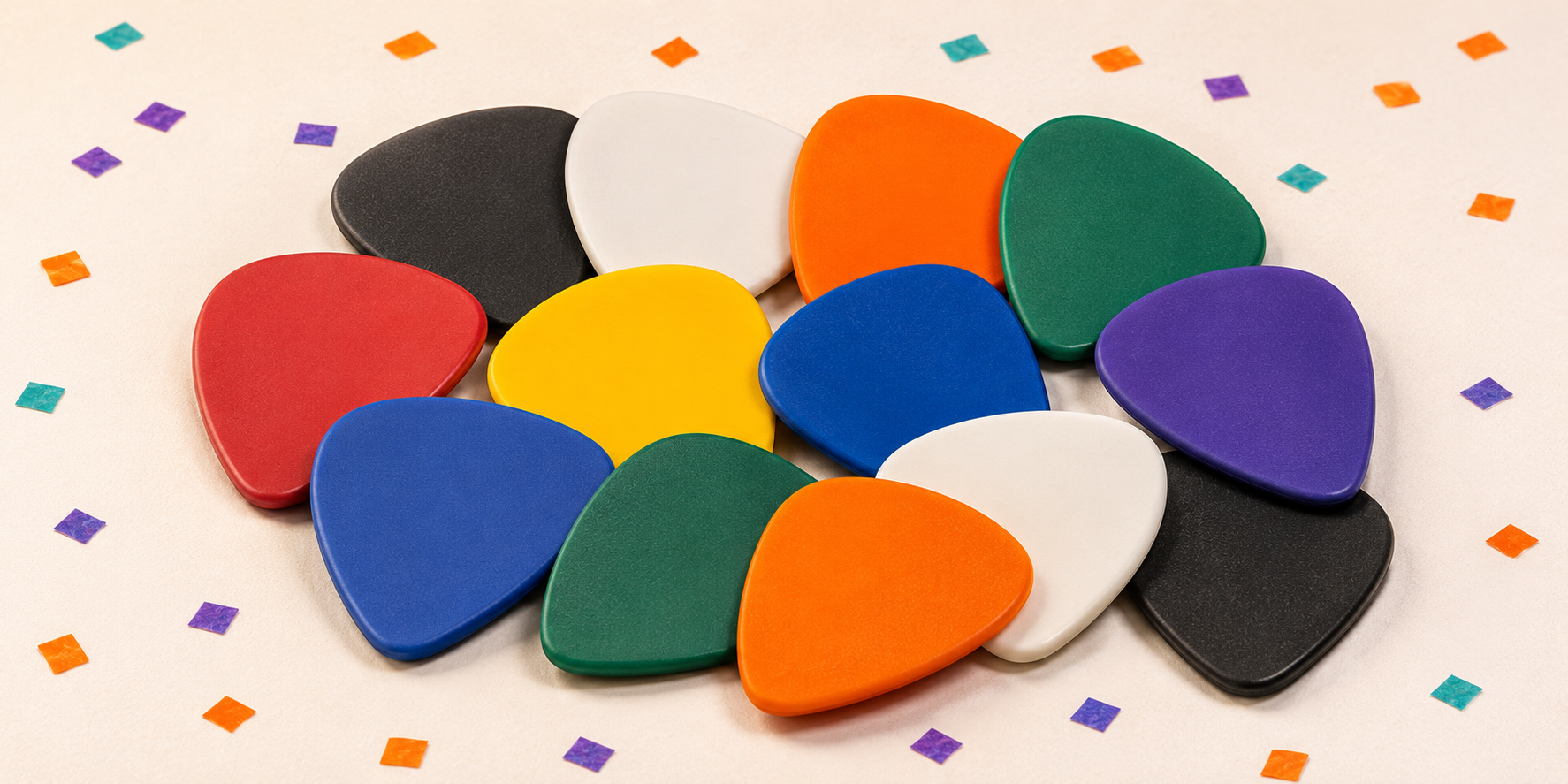 Twelve matte Delrin guitar picks in a surprise assortment of colours